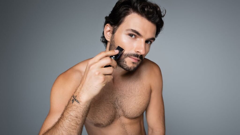 Body hair trimming or shaving in specific areas man trimming beard