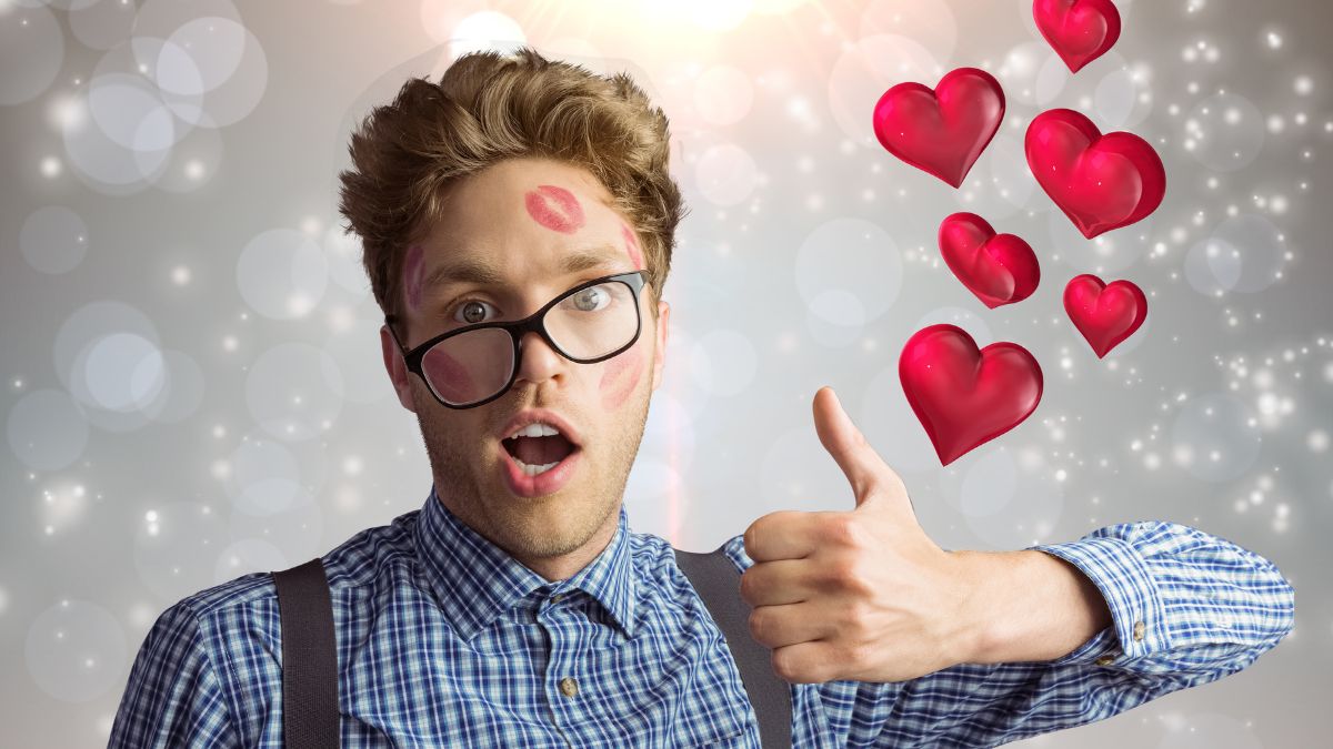 Man with glasses, hearts around his head, thumbs up-