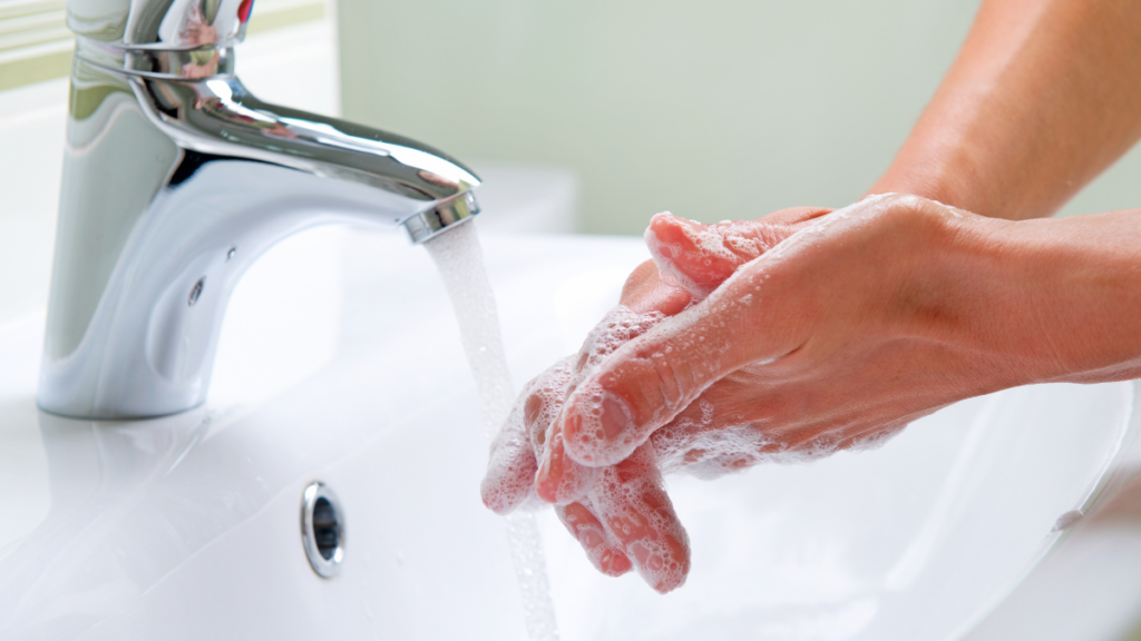 person washing hand